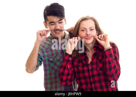 Junges Paar in karierten Hemden mit Schnurrbart Haar Stockfoto