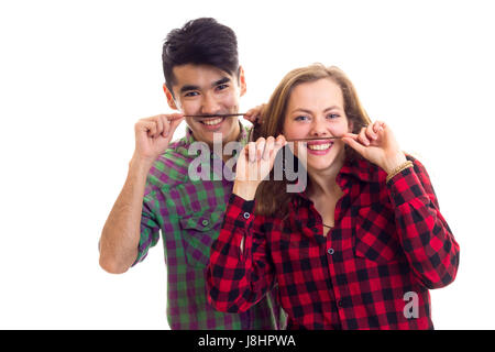 Junges Paar in karierten Hemden mit Schnurrbart Haar Stockfoto