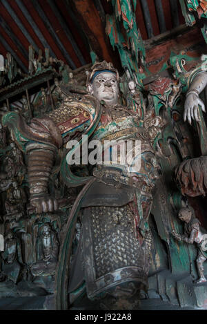 Skanda Statue ist in der Halle ein tausend Buddhas, Shuanglin Tempel, ein großer buddhistischer Tempel aus der Ming-Dynastie, Pingyao, Shanxi Provinz, China Stockfoto
