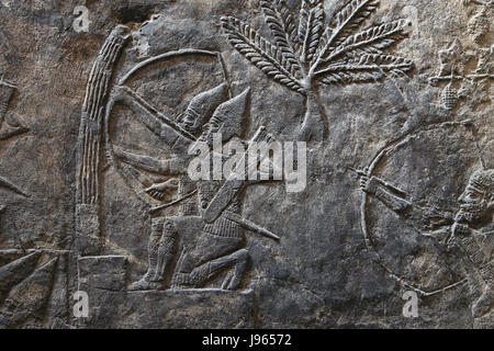 Angriff auf die Stadt - Alammu. Assyrische, 700-692 v. Chr.. Süd-West. Zimmer XIV. Bogenschützen. Ninive. Irak. Irak. British Museum. London. Stockfoto