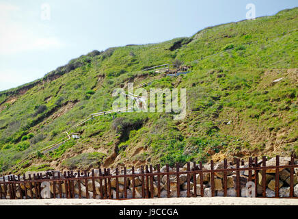 Ein Zugang zum Strand weg die Liquidation der Westen Klippen am mundesley-on-sea, Norfolk, England, Vereinigtes Königreich. Stockfoto