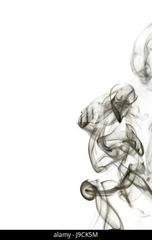 Abstrakter schwarzer Rauch wirbelt auf weißem Hintergrund Stockfoto