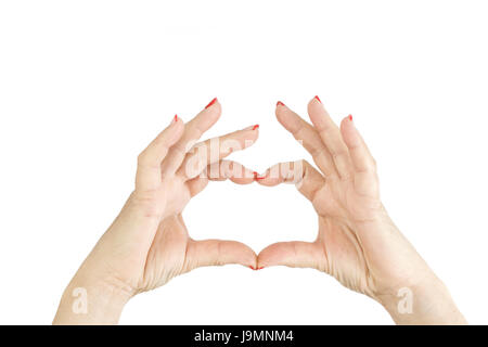 Frau die Hände mit Herzsymbol isoliert auf weißem Hintergrund. Zwei Hände in Form von Herzen. Geste Liebe Herzform. Stockfoto