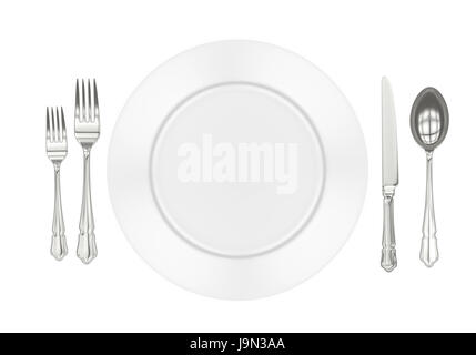 Leeren Teller mit Löffel, Messer und Gabeln Stockfoto