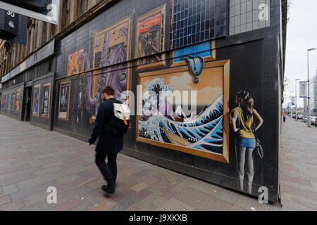 Glasgow-Kunst im öffentlichen Raum-Graffiti auf der Argyle Street mit den Auftrag anzeigen Om Website zu bauen um für neues Hotel abgerissen werden Stockfoto