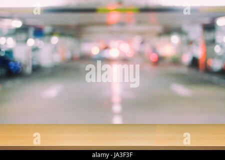 Kreisförmige Bokeh Backgroundand Bokeh Goldfarbe abstrakten Hintergrund von Happy New Year und Christmaslight in dunkler Nacht mit Perspektive Holz abstrakt Stockfoto