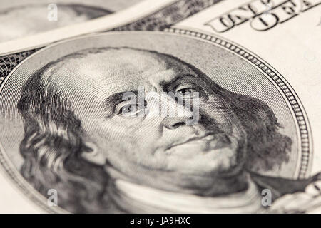 Makro Nahaufnahme von Benjamin Franklins Gesicht auf die US $100 Dollar-Schein. Stockfoto