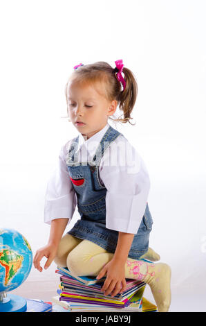 kleinen Mädche und Bücher Stockfoto