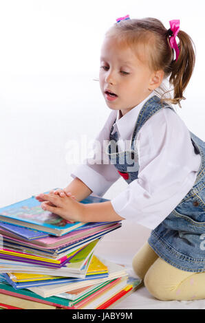 kleinen Mädche und Bücher Stockfoto