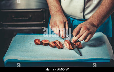 Vorbereitung der traditionellen Rindersteak Stockfoto