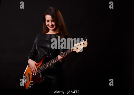 Foto eines Mädchens mit Gitarre Stockfoto