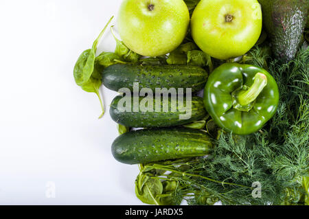 Frische, Bio Gemüse - Petersilie, Paprika, Apfel, Gurke und Zucchini. Gesunde Ernährung-Hintergrund Stockfoto