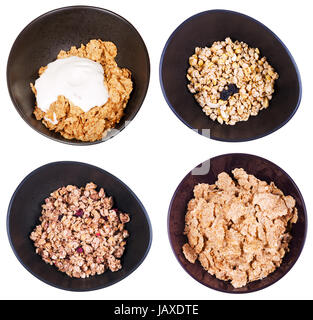 Satz von Draufsicht Getreide in dunkle Schale isoliert auf weißem Hintergrund Stockfoto