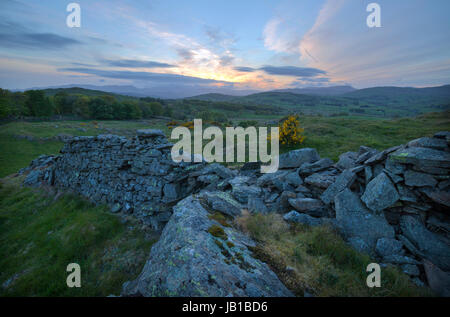 Sonnenuntergang über einer ländlichen Umgebung am Gauner im Lake District Stockfoto