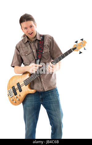 Bass-Gitarrist spielt seinen Bass mit einem Lächeln (Serie mit dem gleichen Modell verfügbar) Stockfoto