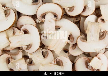 frische Champignons Scheiben als eine Hintergrundtextur Essen Stockfoto