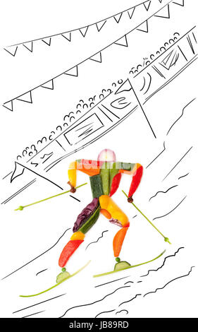 Obst und Gemüse in Form von Winter Skifahrer zwischen Polen vorbei. Stockfoto