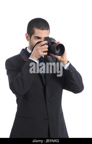 Professionellen Fotografen fotografieren mit einer digitalen Dslr-Kamera auf einem weißen Hintergrund isoliert Stockfoto