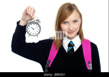 Sehr charmante Schülerin Zeit Stück isoliert gegen weiß. Stockfoto