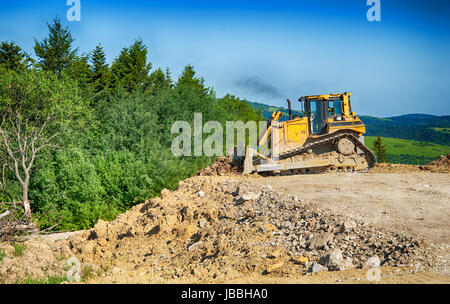 Planierraupe einen beweglichen Land Schaufel Stockfoto