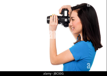 Professionelle weibliche Mode-Fotograf eine Momentaufnahme. Stockfoto