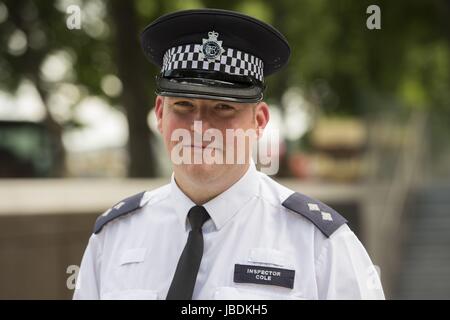 Metropolitan Police Inspector Jim Cole im New Scotland Yard, London, wo er seine Rolle in der Antwort der Polizei auf der London Bridge-Angriff bezeichnet. Stockfoto