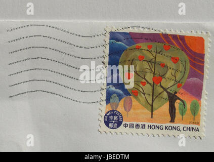HONG KONG, CHINA - 21. März 2014: Eine Briefmarke gedruckt durch chinesische Beiträge zeigt eine Zeichnung von einem Baum Stockfoto