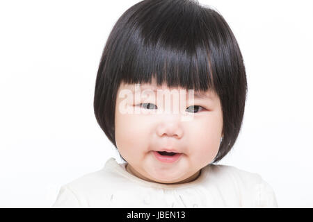 Baby Mädchen Lächeln in Asien Stockfoto