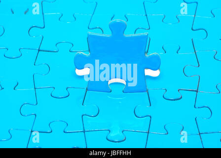 blauer Hintergrund-Puzzle. Business-Konzept Stockfoto