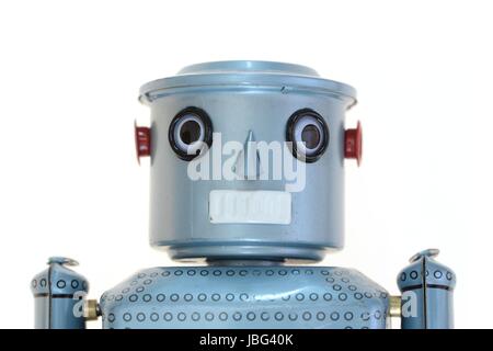 Ein Roboter auf dem weißen Hintergrund isoliert Stockfoto