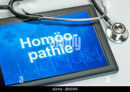 Tablet Mit Dem Text Homöopathin Auf Dem Display Stockfoto