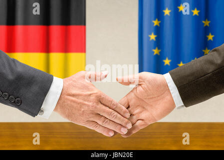 Vertreter Deutschlands Und der EU Reichen Sich Die Hand Stockfoto