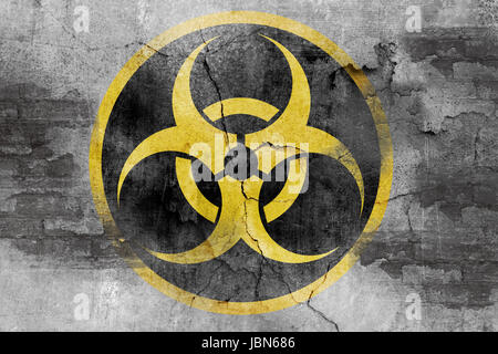 Biohazard-Symbol auf Betonwand Stockfoto