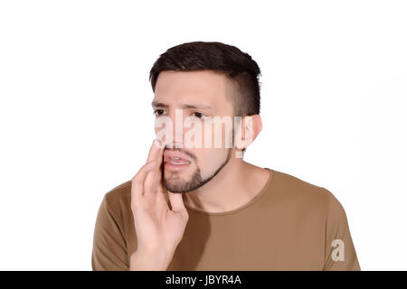 Porträt eines jungen Mannes besorgt. Isoliert weißer Hintergrund. Stockfoto