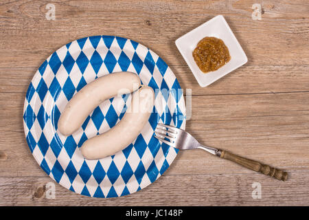 Zwei Weisswürste Mit Süssen Senf Auf Einem Teller Mit Gabel Stockfoto