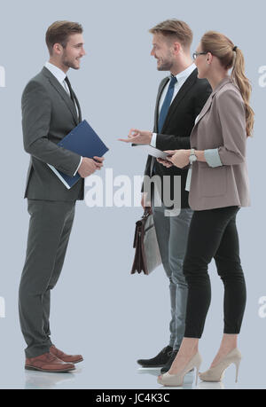 Glücklich Geschäftsleute in festlich gekleidet, die Diskussion über ein neues Projekt. Stockfoto