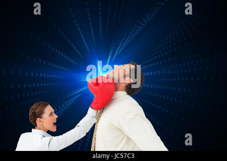 Zusammengesetztes Bild der Geschäftsfrau schlagen einen Geschäftsmann mit Boxhandschuhen Stockfoto