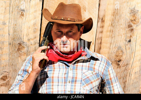 AUS WEST - braucht ein Cowboy Zeit um sich auszuruhen und zu reflektieren. Stockfoto