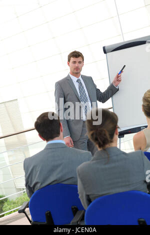 Gruppe von Menschen, die Teilnahme an Business-Präsentation Stockfoto