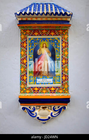 Wand Tafel von Jesus in bunt und historische Architektur in San Juan Puerto Rico Stockfoto