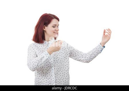 Junge lächelnde Student Mädchen Geschäftsfrau, wies darauf hin mit einem Bleistift zu seinem Gesicht, die versuchen, eine Skizze von ihrem Emotion zu zeichnen. Selbst die Idee, selbst Deve erstellen Stockfoto