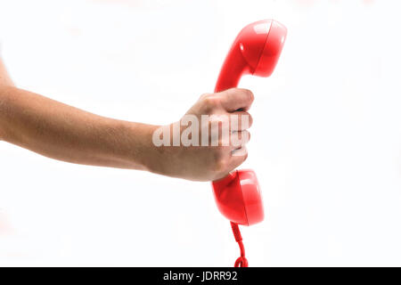 Rote Telefon-Empfänger in der hand Stockfoto