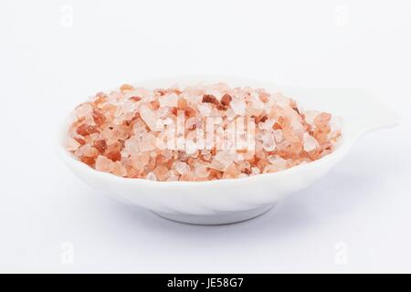 Himalaya-Salz auf weißem Hintergrund Stockfoto