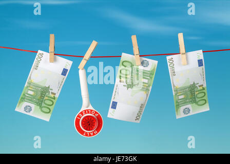 Euro Banknoten und Polizei Tennisschläger auf der Wäscheleine, Stockfoto