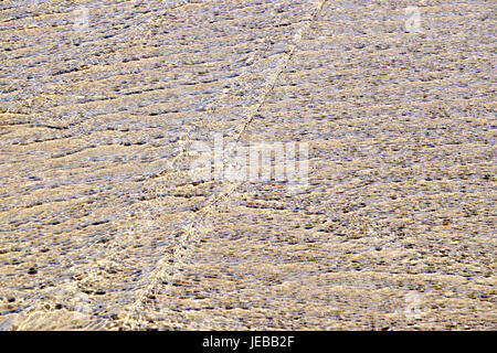 Wellen der Flut über Sand am Strand von Whitesands, Pembrokeshire Stockfoto