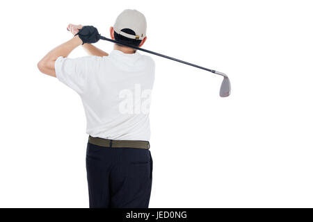Rearview der asiatische chinesische Mann Swinging Golf Club in isolierten weißen Hintergrund Stockfoto