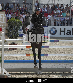 Pferderennen, Deutsche Meisterschaften springen und training im Jahr 2010 in Münster, Springreiterinnen, Joerne Sprehe auf Contifax, Stockfoto