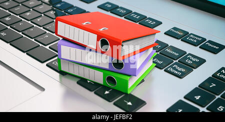 Bunte Ringbücher auf einer Laptoptastatur. 3D illustration Stockfoto