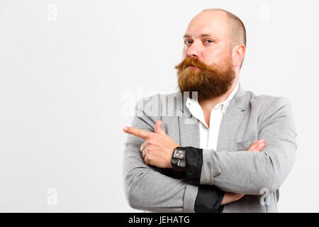 Mann Punkte Finger zur Seite Stockfoto