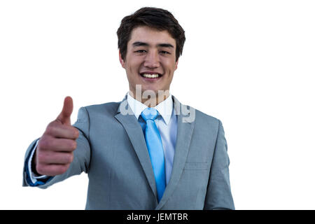 Lächelnde asiatische Geschäftsmann Daumen auftauchen Stockfoto